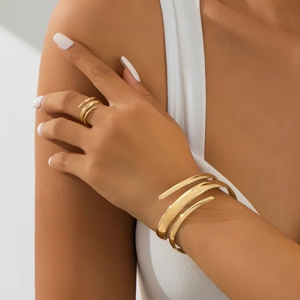 2 pieces Elegant Gold-Tone Bangle and Ring Set. Bracelet Set